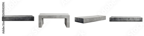 A collection of sleek minimalist concrete furniture pieces including a table bench and slab blocks showcasing a contemporary industrial inspired design aesthetic photo