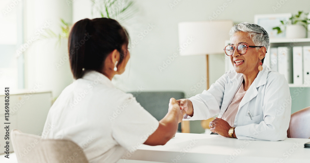 Obraz premium Appointment, handshake or healthcare with doctor and patient in office of hospital for consulting. Conversation, medical or meeting with mature medicine professional and woman shaking hands in clinic