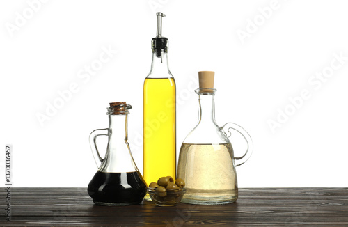 Wallpaper Mural Salad dressings and olives on wooden table against white background Torontodigital.ca