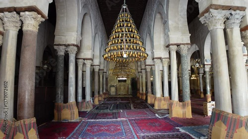 View towards prayer rooms of the Great Mosque of Kairouan, Islam religion and historic landmark in Tunisia
