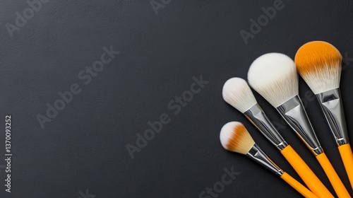 Colorful Makeup Brushes on Dark Background for Beauty Composition