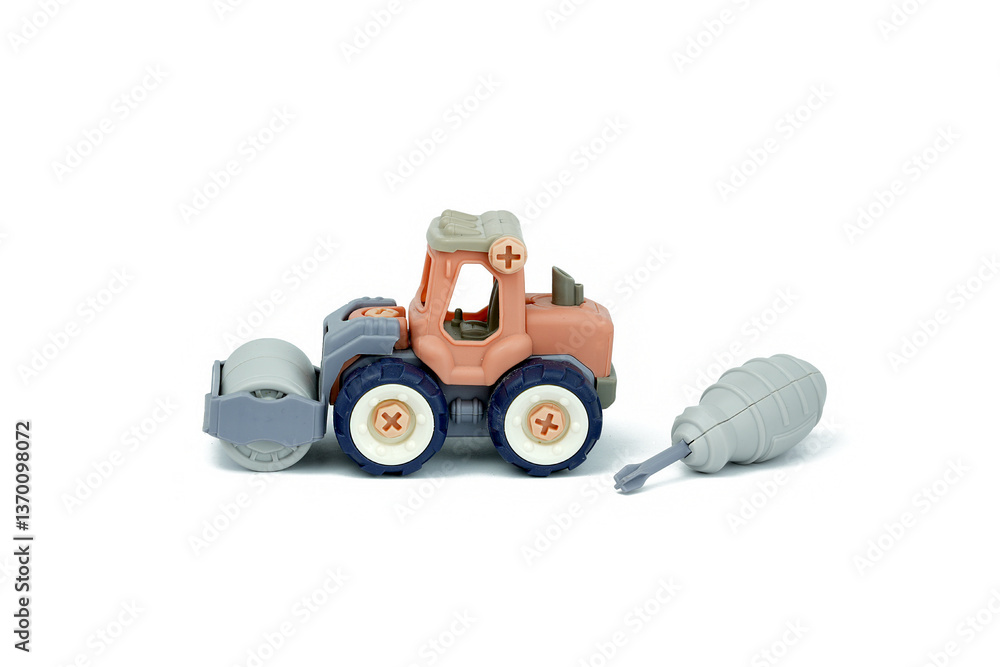 Plastic road roller that disassembles into parts with fines isolated on white background Plastic road roller that disassembles into parts with fines isolated on white background
