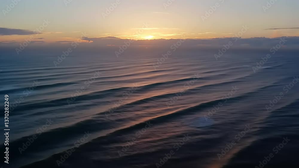 Serene sunset over gentle ocean waves, capturing the tranquil beauty of nature's evening display Serene sunset over gentle ocean waves, capturing the tranquil beauty of nature's evening display
