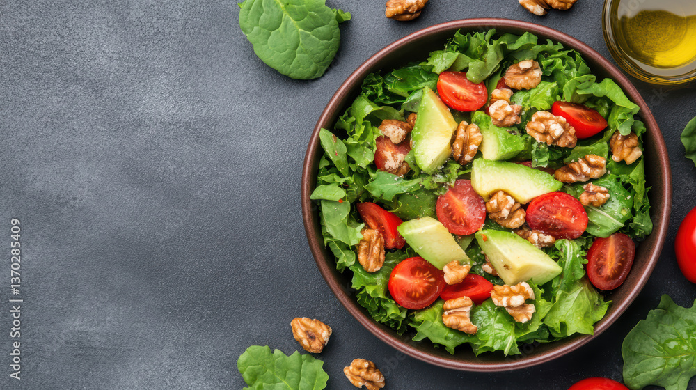 Fresh salad with leafy greens, tomatoes, walnuts, and avocado, perfect for healthy meal Fresh salad with leafy greens, tomatoes, walnuts, and avocado, perfect for healthy meal