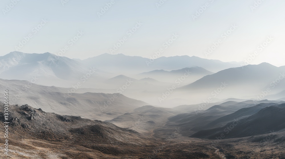 Serene Misty Mountain Landscape at Dawn with Layers of Mountains Creating a Beautifully Ethereal Atmosphere Ideal for Nature Photography and Scenic Backgrounds Serene Misty Mountain Landscape at Dawn with Layers of Mountains Creating a Beautifully Ethereal Atmosphere Ideal for Nature Photography and Scenic Backgrounds