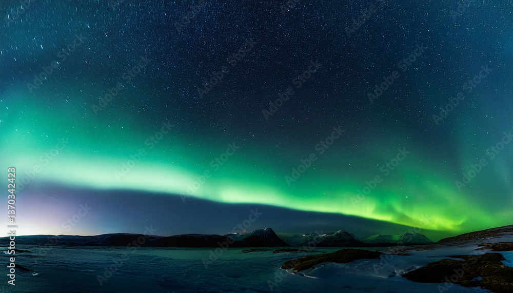 Beautiful green northern lights (aurora borealis) on a night full of stars in the background Beautiful green northern lights (aurora borealis) on a night full of stars in the background