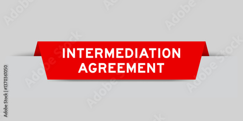 Red color inserted label with word intermediation agreement on gray background