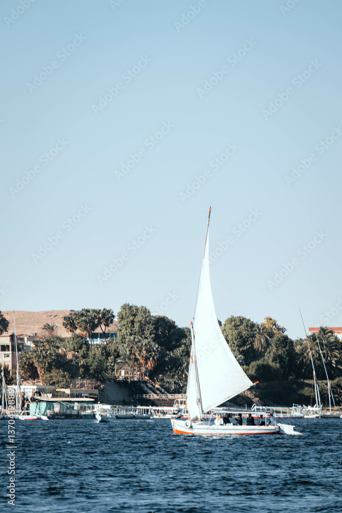sailboat on the Nile River in Aswan, Egypt sailboat on the Nile River in Aswan, Egypt