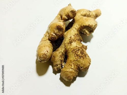 close up view of ginger on white background