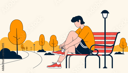 Focused young athlete tying shoelaces in urban park, personal dedication
