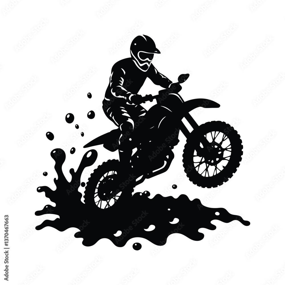 motocross rider splashing through a muddy puddlle motocross rider splashing through a muddy puddlle