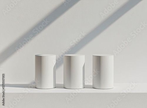 Minimalist White Cylinder Product Display on Shelf with Sunlight Shadow