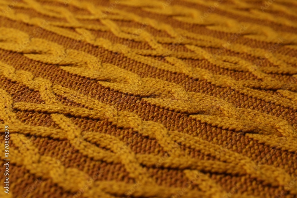 Orange knitted wool texture as background, closeup Orange knitted wool texture as background, closeup