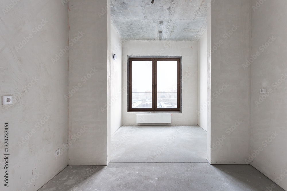 interior of the apartment without decoration in gray colors. rough finish interior of the apartment without decoration in gray colors. rough finish