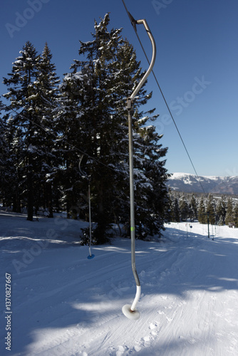 Empty button drag lift on a beginner slope in the mountains
