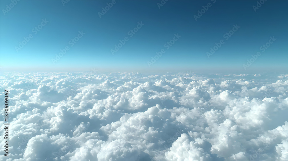 Fototapeta premium High Altitude View Of Fluffy White Clouds Against A Bright Blue Sky