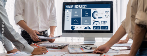 Obraz na płótnie Human resources management software on computer screen helping human resources employee to manage recruitment, payroll, staff searching and KPI evaluation brisk w salonie