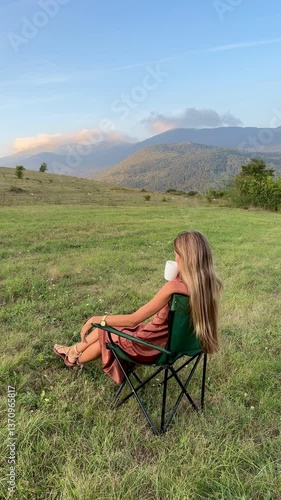 young woman sitting on a bench
