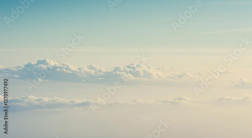 Wallpaper Mural Serene Aerial View of Soft Cumulus Clouds and Hazy Sky at Dawn or Dusk Torontodigital.ca