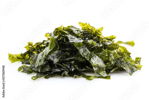 Pile of dried seaweed on a white background, showcasing its texture and color for culinary use