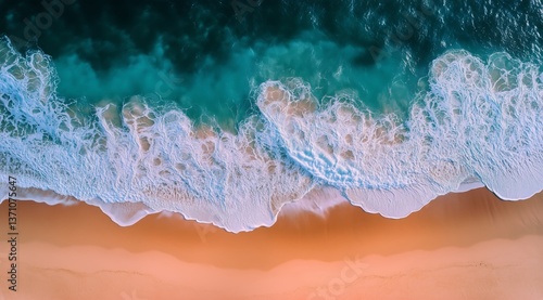 Waves Gently Crashing on a Sandy Shore During Daylight Hours at a Coastal Loc...