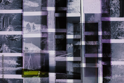 Vintage medium format film negatives arranged in overlapping layers, creating abstract geometric pattern. Black and white photographic strips with travel memories 