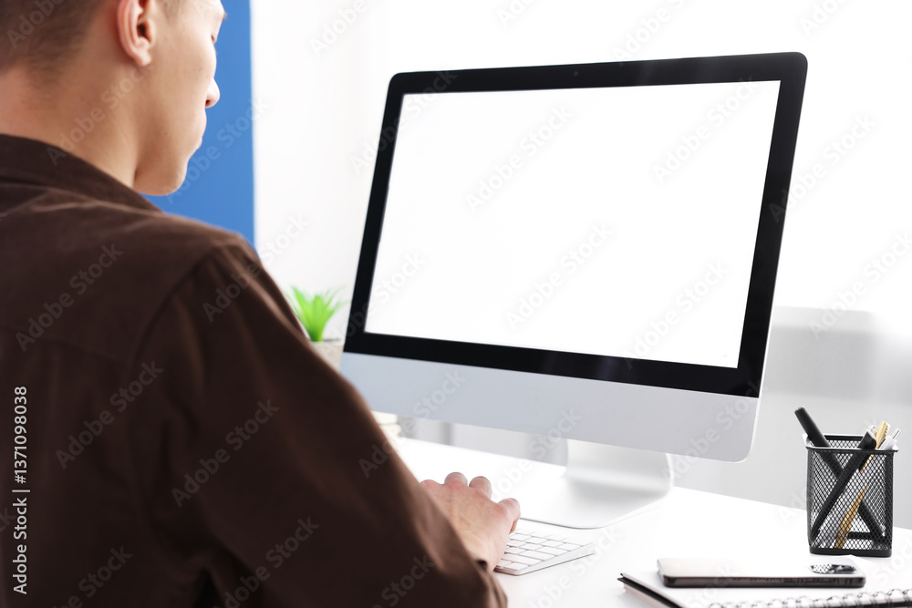 Man working on computer at white desk in office, closeup. Mockup for design Man working on computer at white desk in office, closeup. Mockup for design