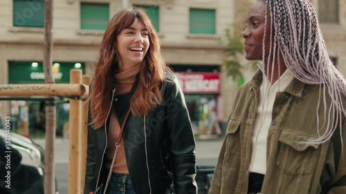 Wallpaper Mural Side view of young lesbians holding hands.  gay, friends or lesbian couple enjoy the time together. Dating, trust and support with female and her girlfriend on holiday, vacation or travel Torontodigital.ca