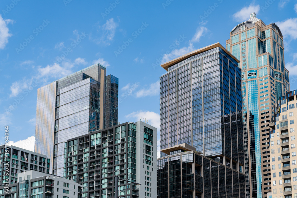 Fototapeta premium Urban cityscape. Skyscraper in city downtown. City architecture. Office building in business district. Residential building. Skyscraper building architecture. Skyscraper cityscape skyline. High rise