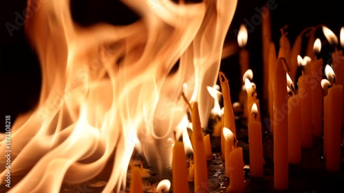 Wallpaper Mural Burnng candles shot in slow motion - flaming candles orange in colour - camera dolly pushing right Torontodigital.ca