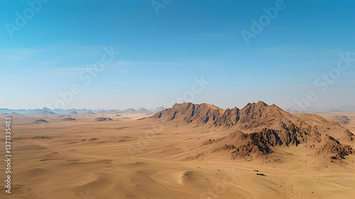 Desert Landscape With Rocky Mountains Under Clear Sky