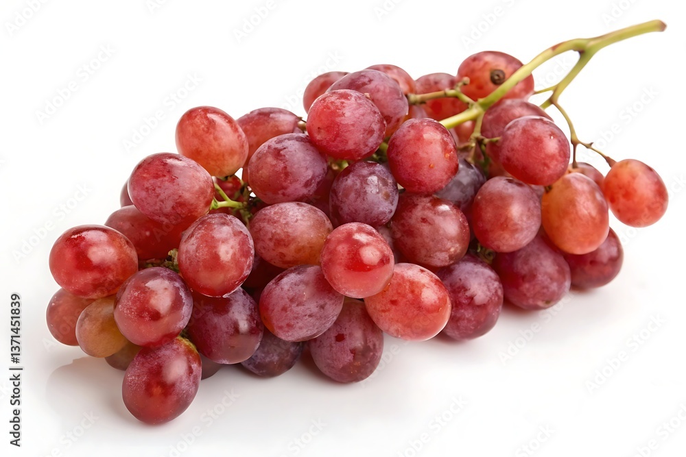 A bunch of fresh red grapes with a stem on a white background close up view A bunch of fresh red grapes with a stem on a white background close up view