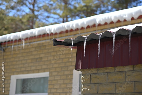 Wallpaper Mural Spring drip from the roof of the house. A row of icicles. Melting snow. Torontodigital.ca