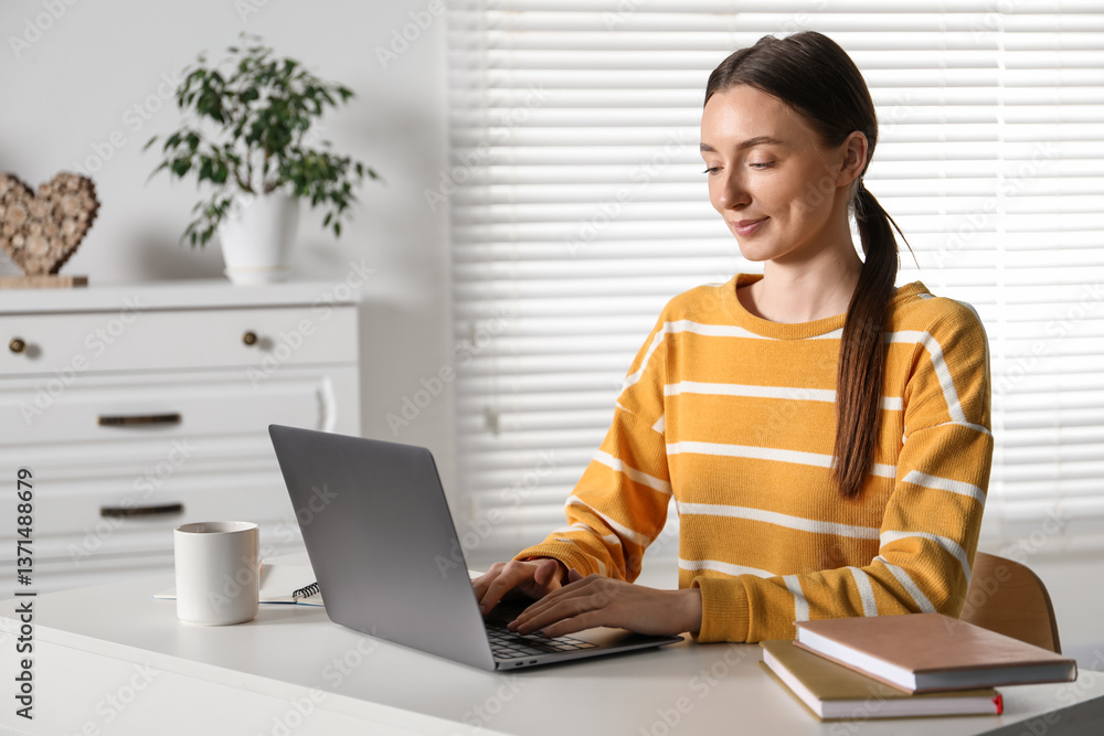 Woman learning online using laptop at table indoors. Self-study Woman learning online using laptop at table indoors. Self-study