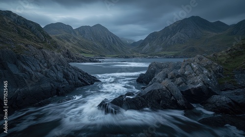 Serene Mountain Landscape with Flowing River and Dramatic Clouds at Dusk in a Remote Valley