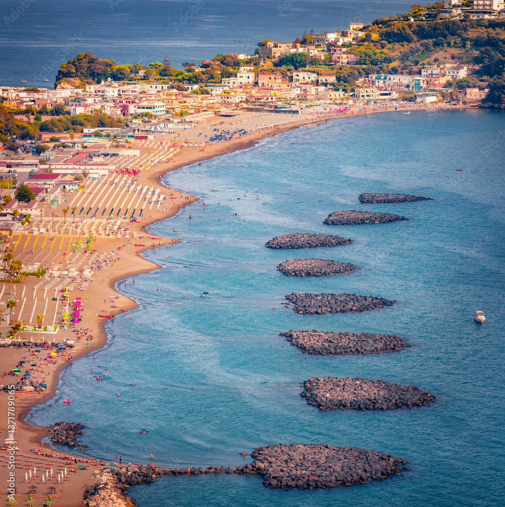 Sunny morning cityscape of Miseno public beach. Bright summer seascape of Mediterranean seascape. Warm outdoor scene of Italy, Europe. Traveling concept background.