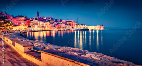 Obraz na płótnie Dramatic summer cityscape of Gaeta port with Cathedral Basilica of Gaeta church on background. Panoramic evening view of coast of Mediterranean sea, Italy, Europe. Traveling concept background. w salonie