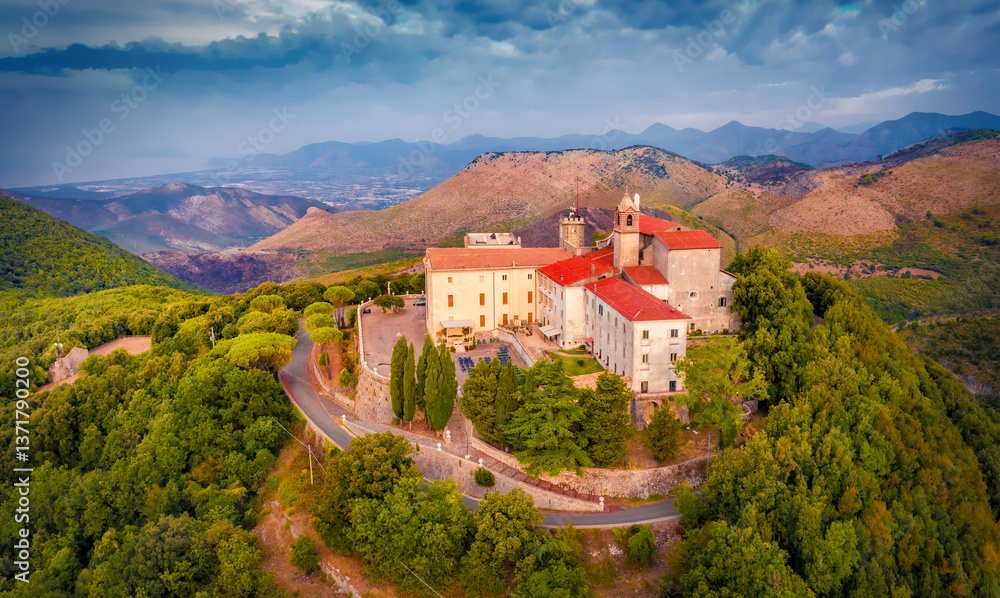 Colorful summer view from flying drone of Sanctuary of the Madonna della Civita Catholic church. Dramatic outdoor scene of Italy, Europe. Traveling concept background.