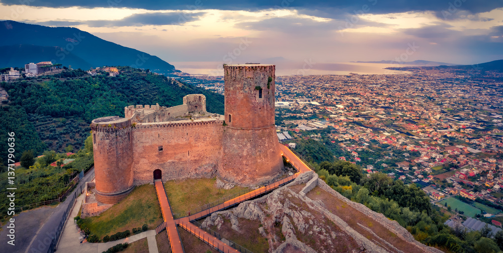 Majestic summer view of Lettere Castlle. Aerial morning cityscape of Scafati town. Stunning sunrise in Italy, Europe. Traveling concept background.