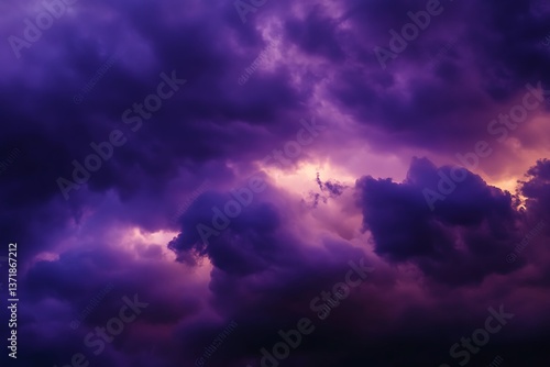 
Dark purple violet blue sky with clouds. Colorful dramatic sky background. Thunderstorm, cloudy, storm, rainy.

