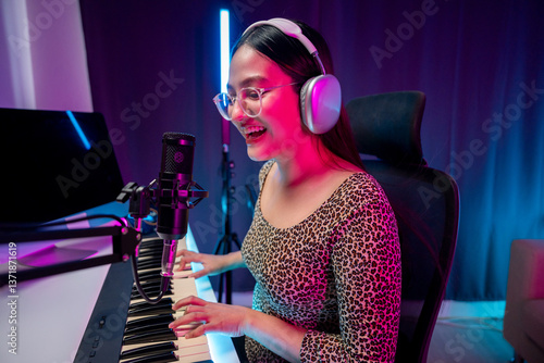 Fényképezés Professional Musician with condenser microphone and tablet for Mixing Mastering music