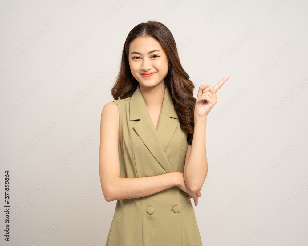 Beautiful smiling happy young asian woman age around 25 in green shirt. Charming female lady standing pose on isolated white background. Asian woman people looking camera confident with backdrop. Beautiful smiling happy young asian woman age around 25 in green shirt. Charming female lady standing pose on isolated white background. Asian woman people looking camera confident with backdrop.