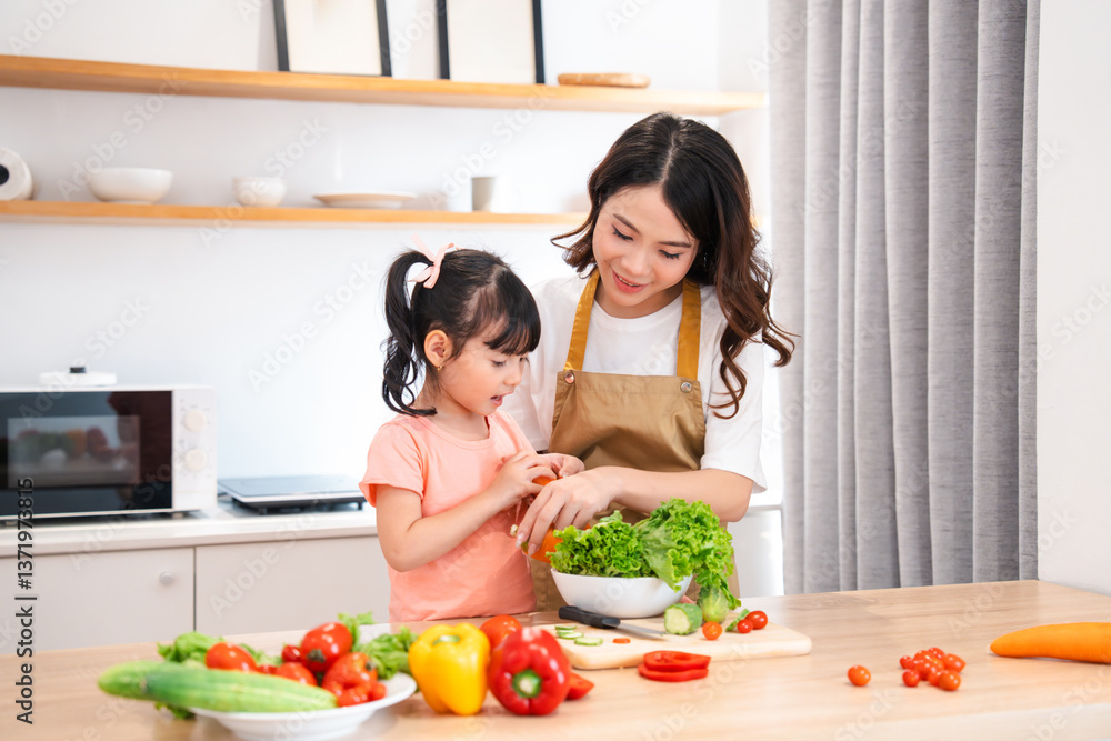 A mother and daughter are preparing vegetables in a bright kitchen together bonding over cooking A mother and daughter are preparing vegetables in a bright kitchen together bonding over cooking