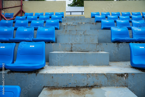 stadium seats for football fans with empty space for advertising, empty seats for football spectators. empty seats on a football field, stadium seats for football supporters.