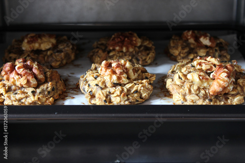 Homemade oat and banana cookies in the oven, dessert for vegan
