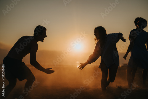 A group of friends interact joyfully outdoors during sunset, creating a warm and lively atmosphere. The scene is filled with energy, playfulness, and the beauty of the evening light.