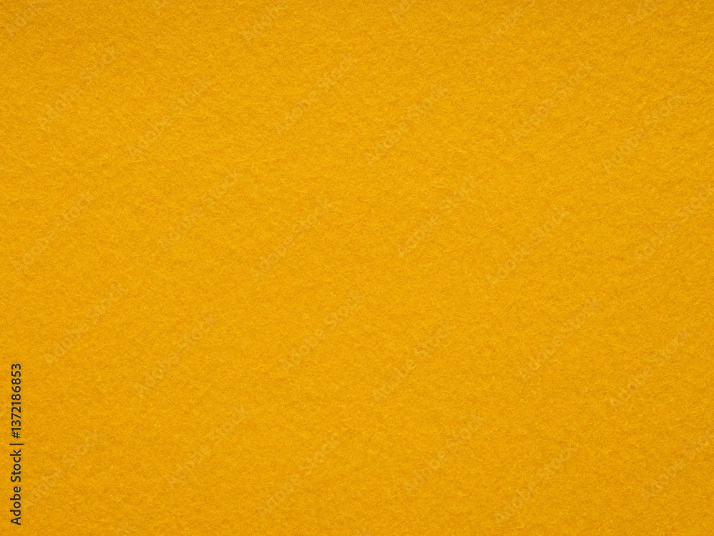 Mustard yellow felt texture emanates warmth and rustic charm, ideal for cozy and inviting design themes