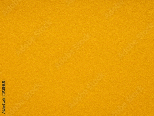 Obraz na płótnie Mustard yellow felt texture emanates warmth and rustic charm, ideal for cozy and inviting design themes w salonie