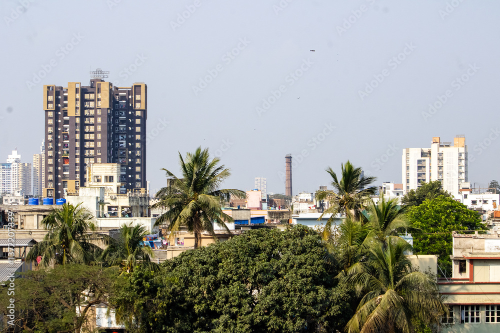 Urban Skyline View with Residential Buildings and Trees During Daytime Urban Skyline View with Residential Buildings and Trees During Daytime