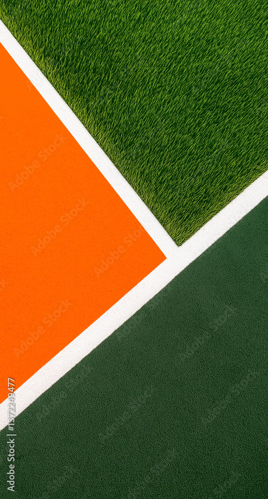 A green and orange tennis court with a white line